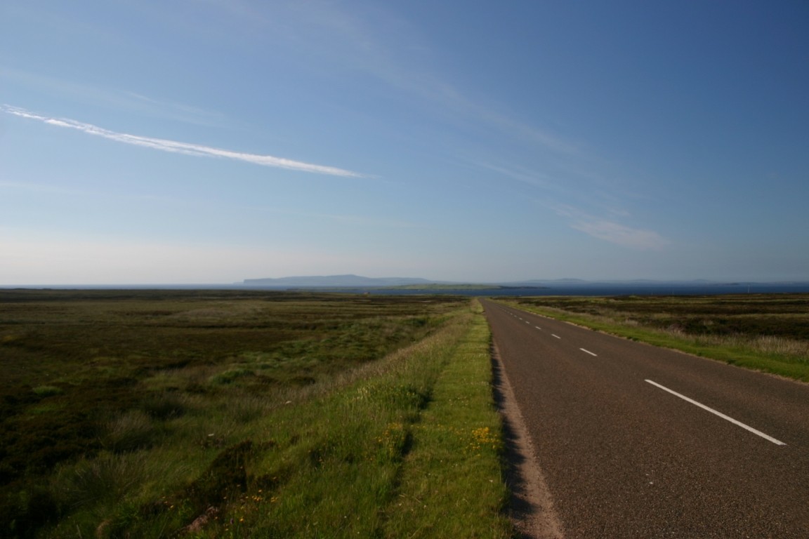 Last Hill Into John O'Groats, Orkney In Background